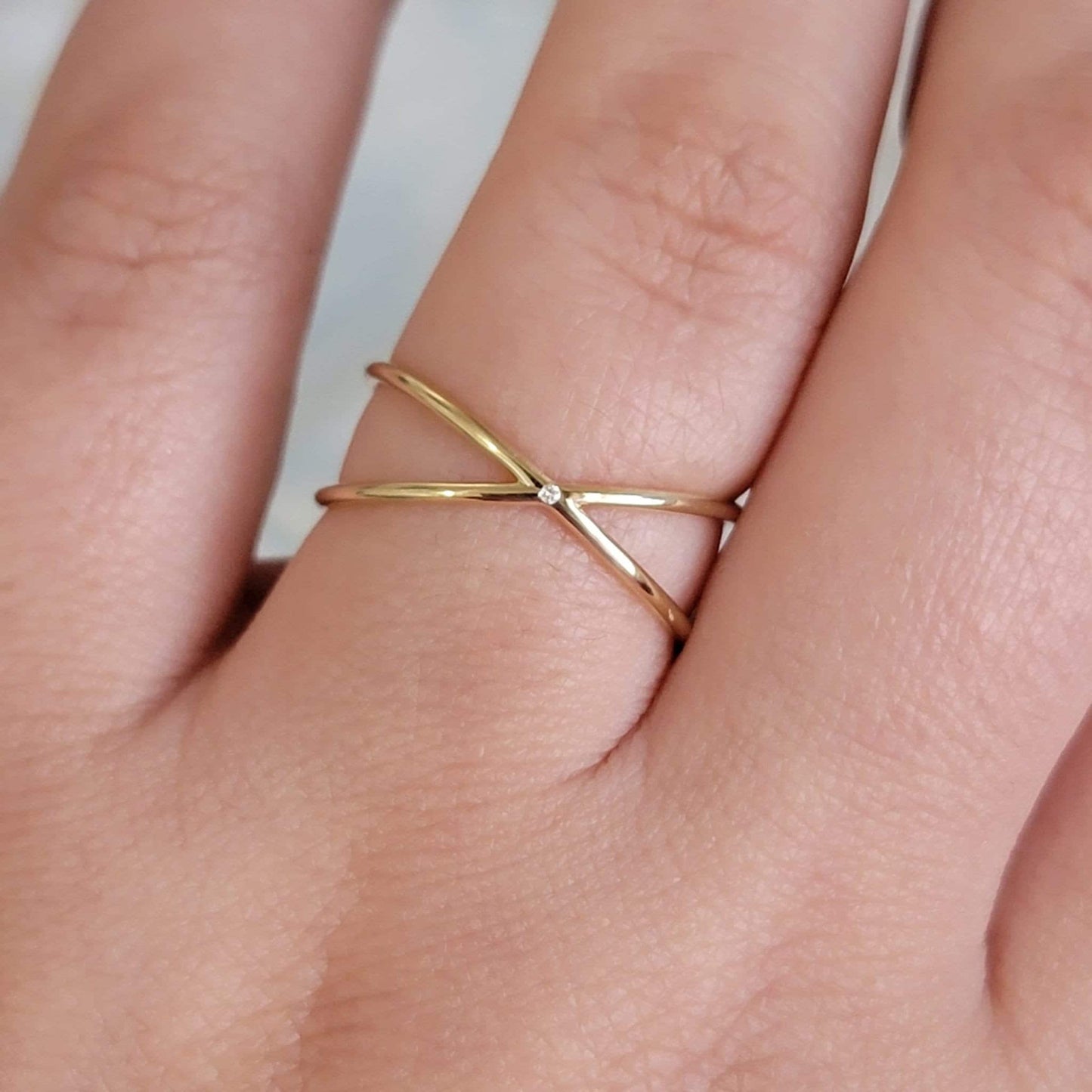14k solid  gold X ring